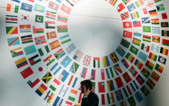 Flags at the World Bank illustrating an article with viewpoints from Boston Consulting Group, or BCG, on how generative AI is reshaping global competition and geopolitics, presenting challenges and opportunities for nations and businesses alike.